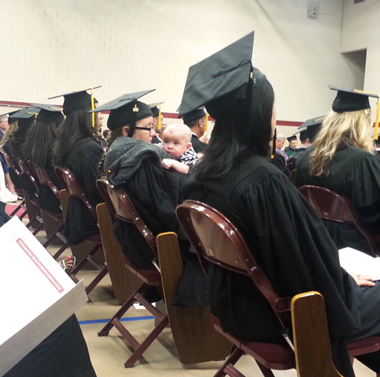 baby at august commencement ceremony