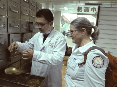 NUHS students measuring ingredients