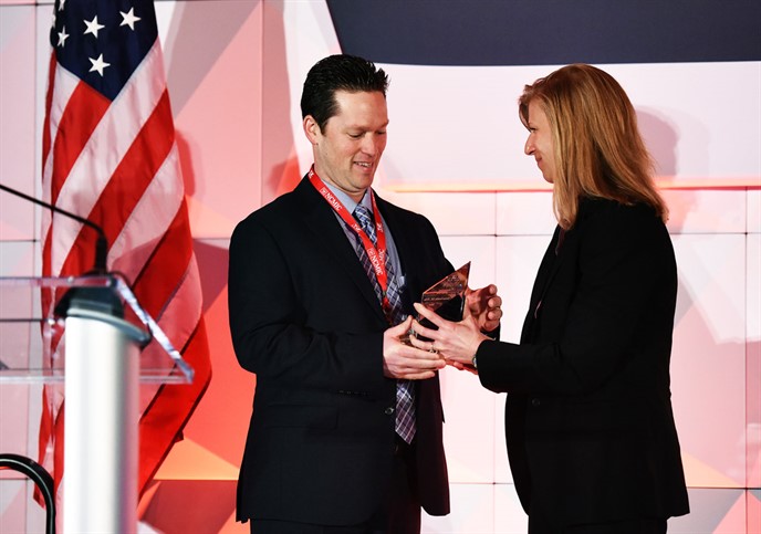 Dean Smith, MS, DC, PhD presented George B. McClelland, DC, Researcher of the Year Award