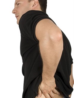 man holding lower back in pain