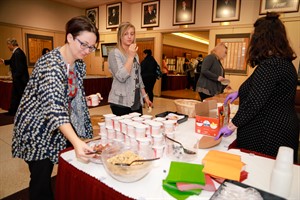 students and faculty at Thanksgiving reception