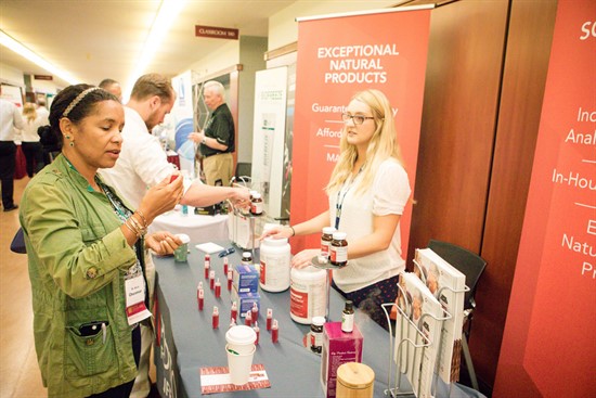 NUHS students meeting with event sponsors