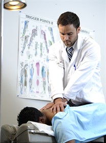 chiropractor performing adjustment