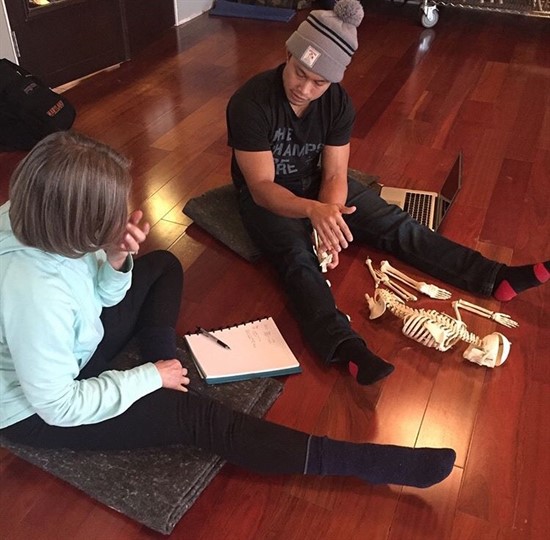 students with skeleton at aurora yoga studio