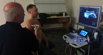 NUHS faculty using new imaging equipment from Konica Minolta