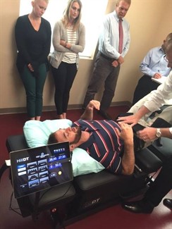 nuhs faculty and students getting decompression table demonstration