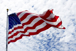 us flag waving flagpole