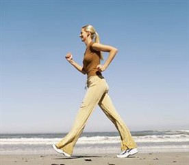 women walking on the beach