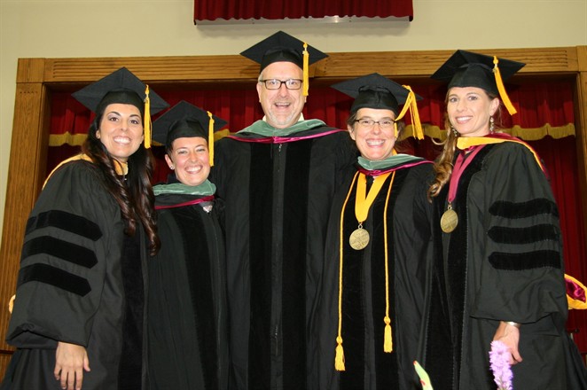 nuhs professors august commencement ceremony