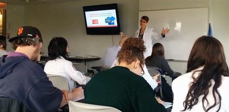 Jill Jennings speaking at grand rounds presentation