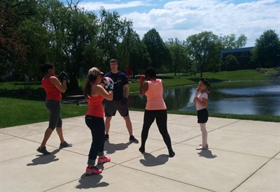 local families practicing boxing at NUHS campus