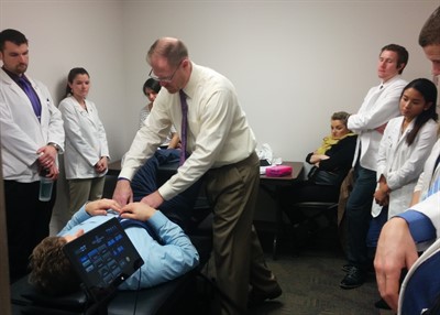 NUHS faculty demonstrating decompression table