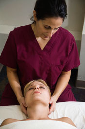 nuhs massage therapy student treating patient