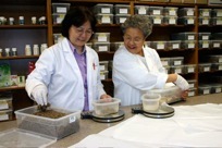 nuhs intern white coat aom dispensary