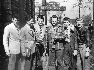 nuhs alums in front of old Chicago General Services clinic
