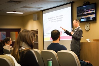 President Joseph Stiefel speaking at student orientation