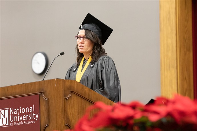 nuhs student delivering commencement address