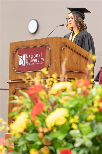 Ivylyn Paul-Van Os delivering commencement address