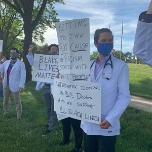 NUHS student demonstrators holding Black Lives matter signs