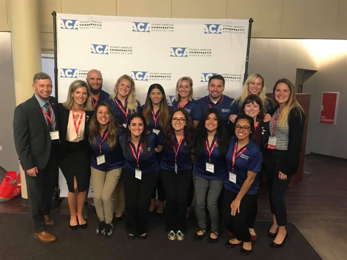 NUHS students and faculty in group shot at SACA Leadership Conference