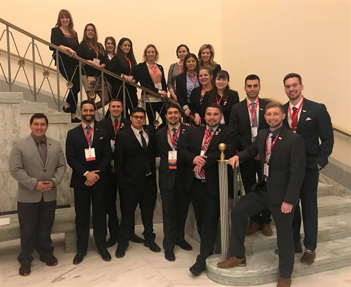 SACA students in group on staircase