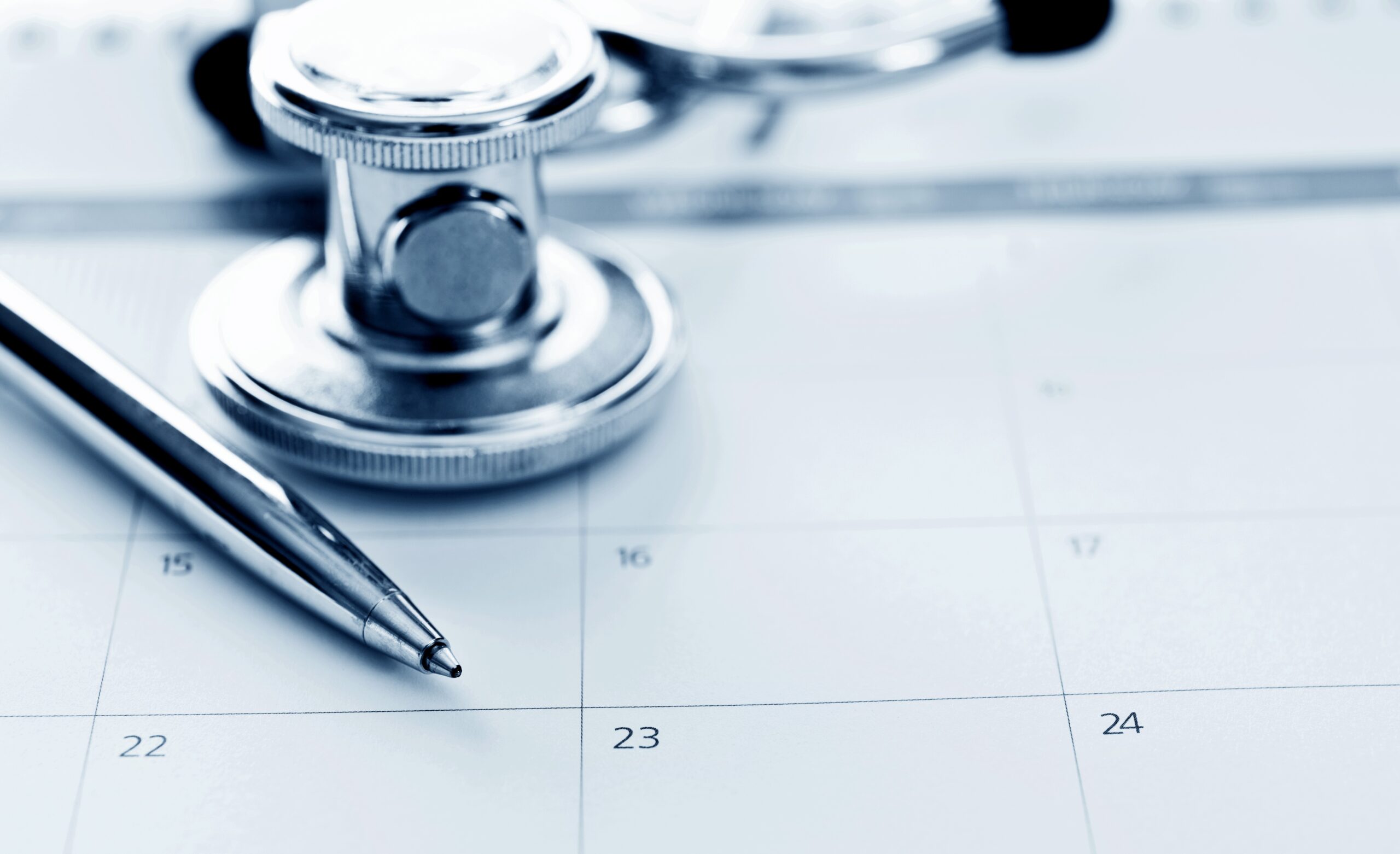 Calendar, stethoscope, pen