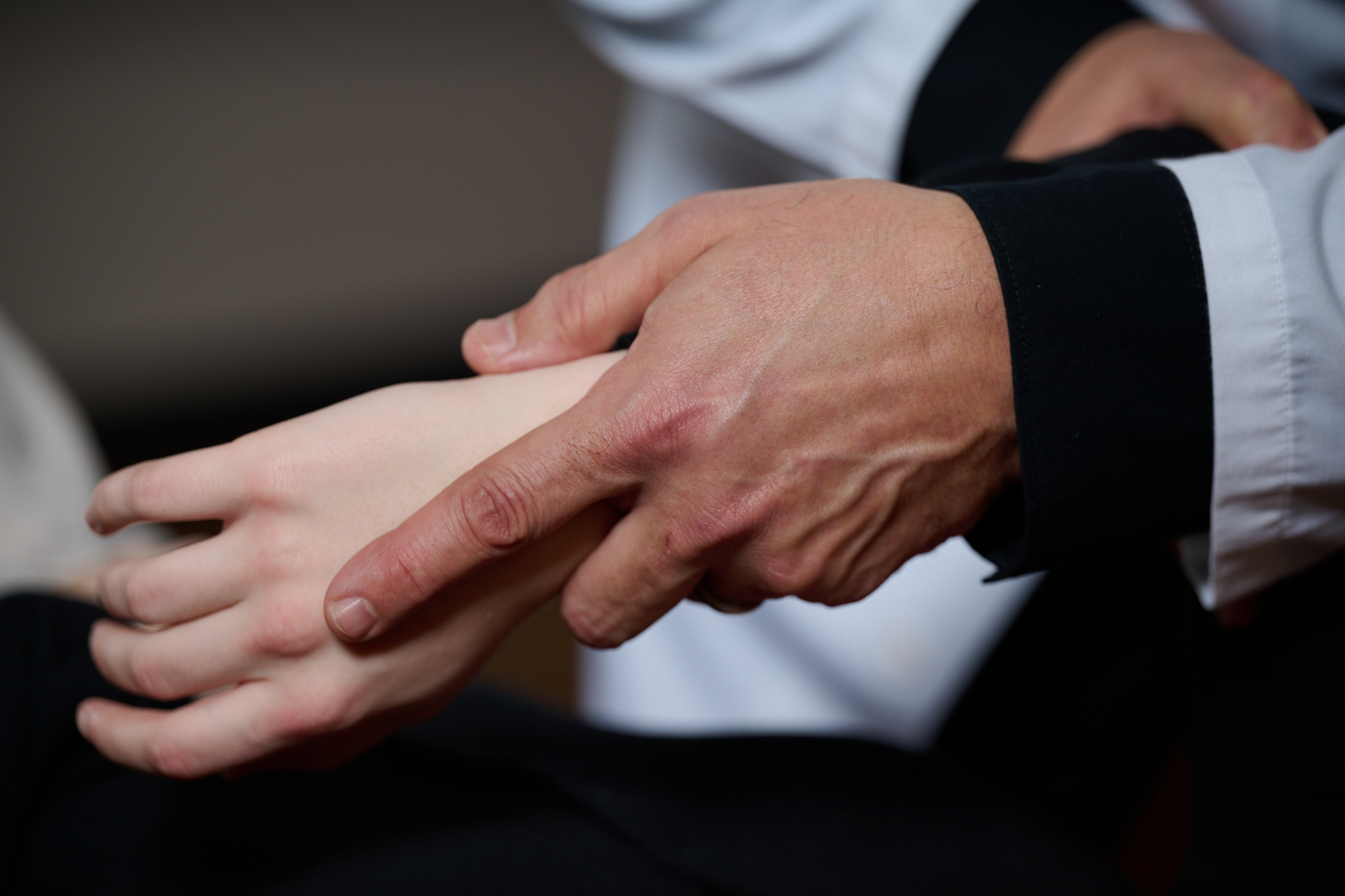 Learning chiropractic technique: hand_wrist adjustment.