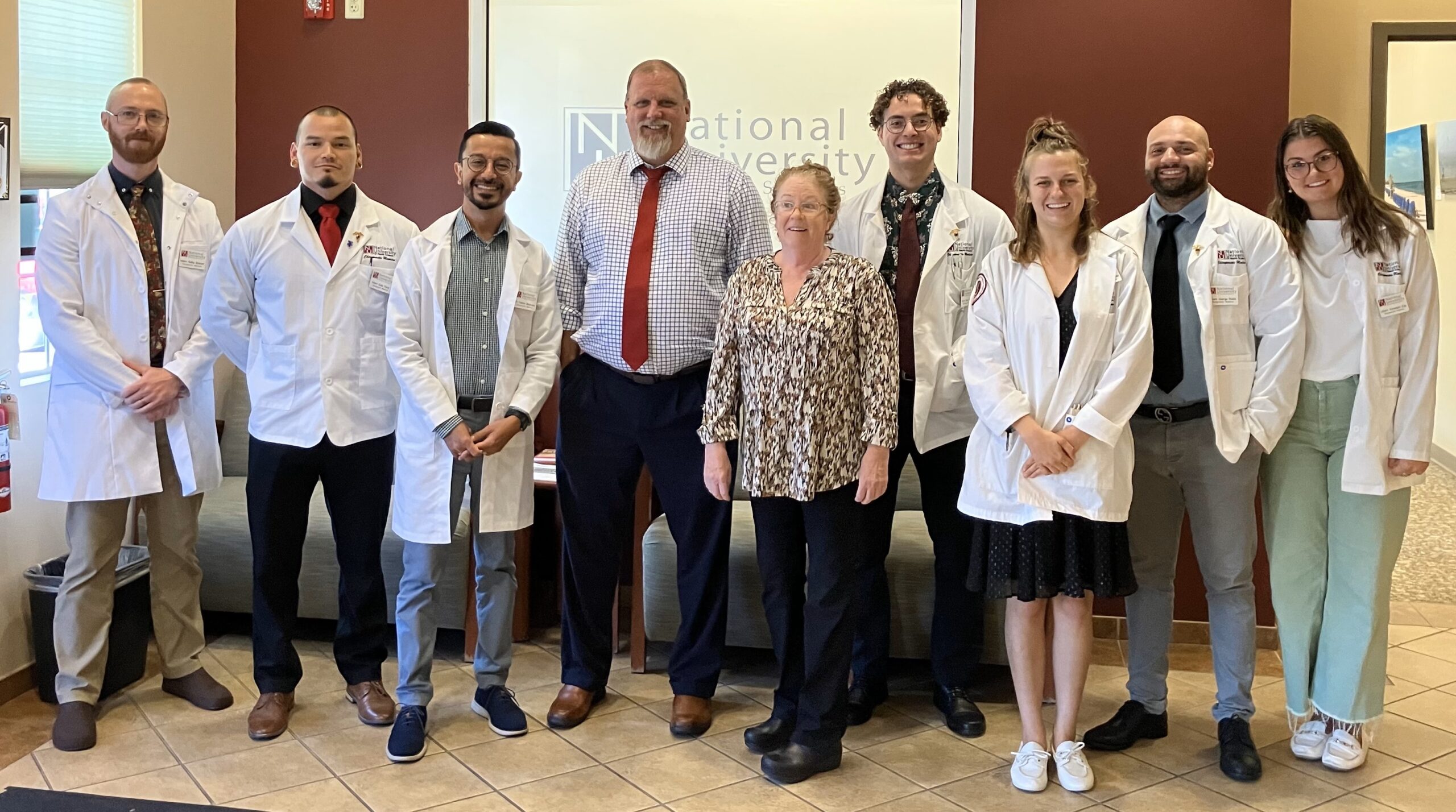 Group photo of NUHS Florida Clinic interns and clinicians.