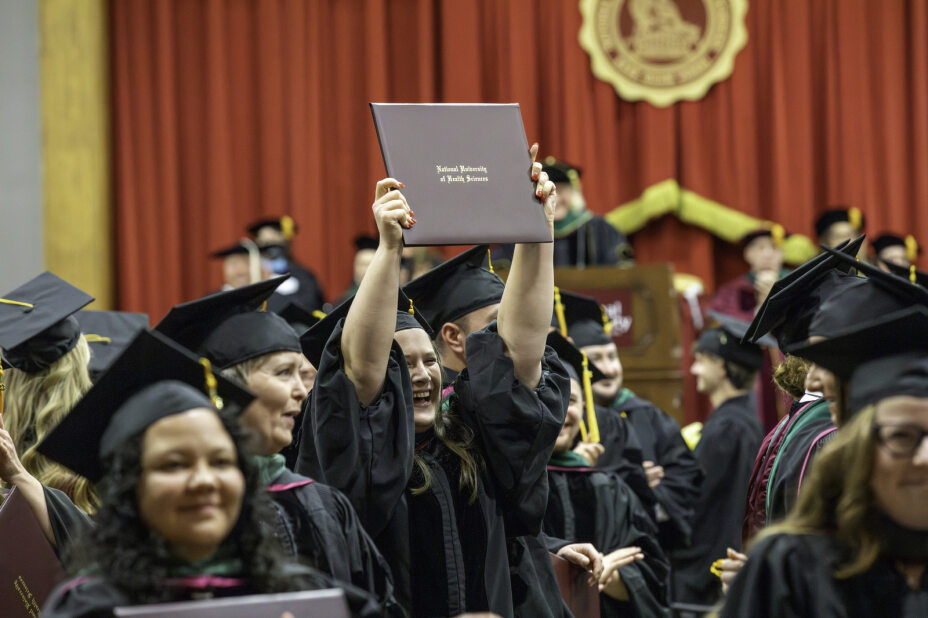 excited students at graduation