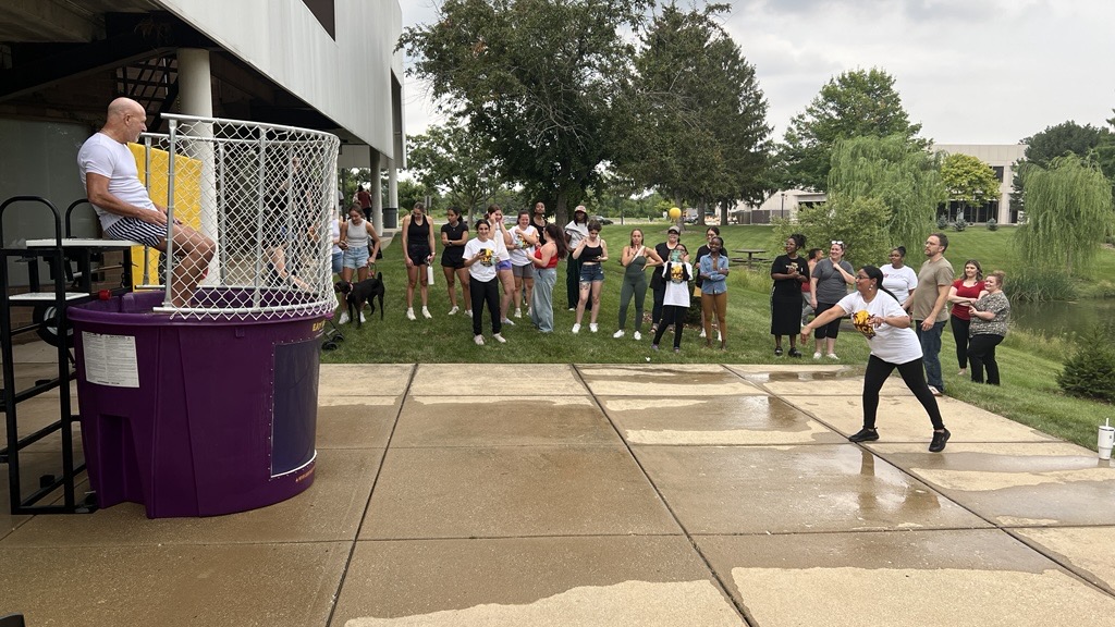 NUHS students, faculty enjoy the Dunk Tank at SummerFest 2025.