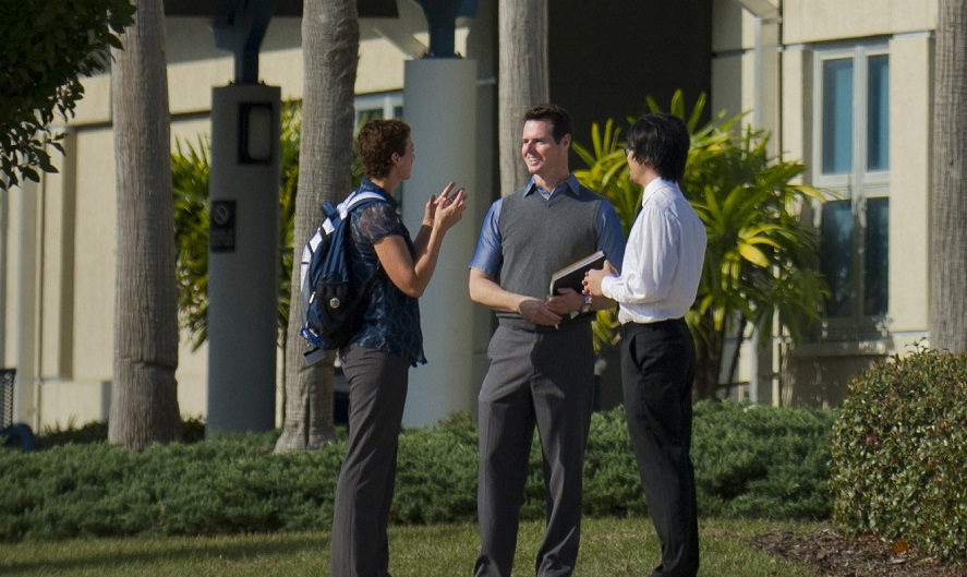 Three students talking outside of the NUHS Florida site