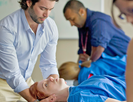 NUHS student learning chiropractic technique