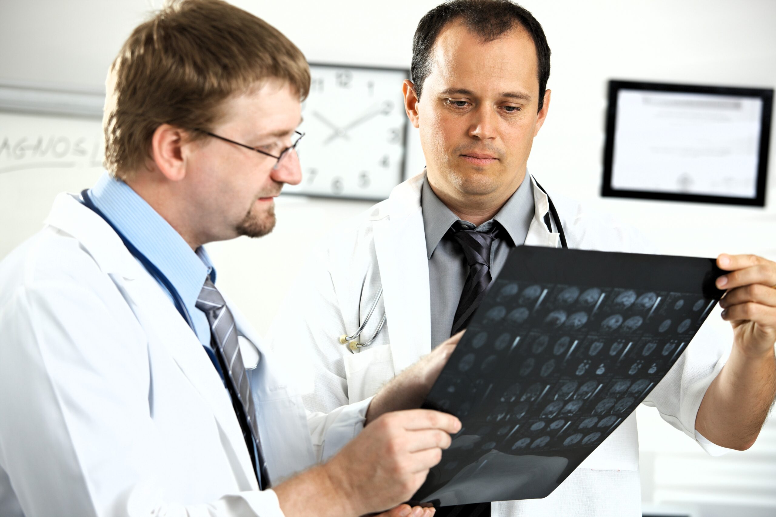 Two male X-Ray techs reviewing films