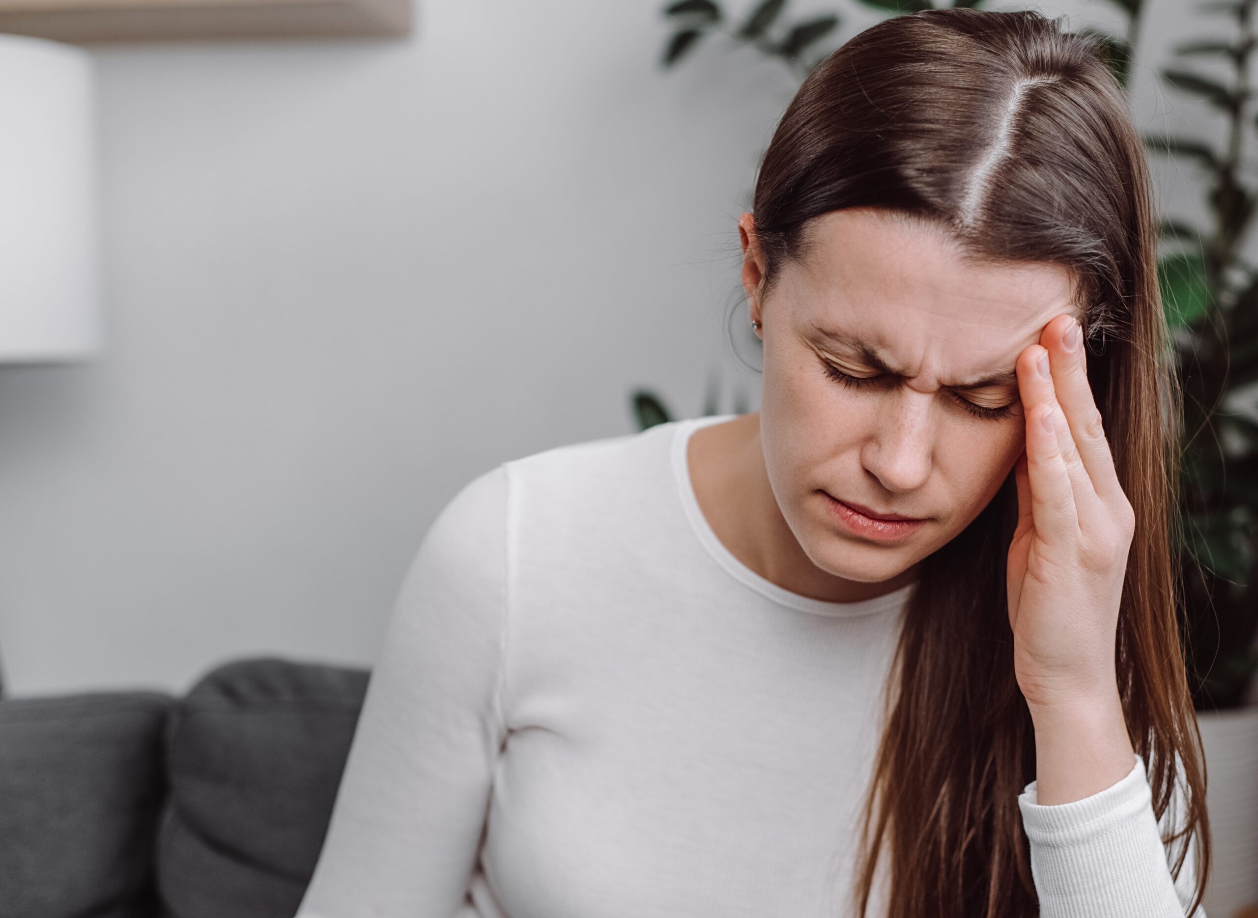 Young female migraine sufferer