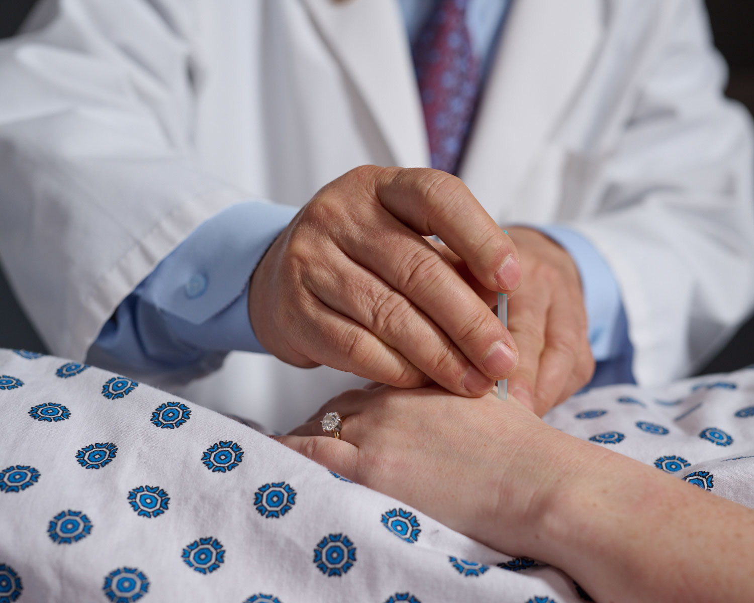 AC instructor demonstrating on patient