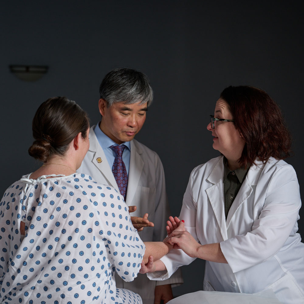 instructor demoing acupressure