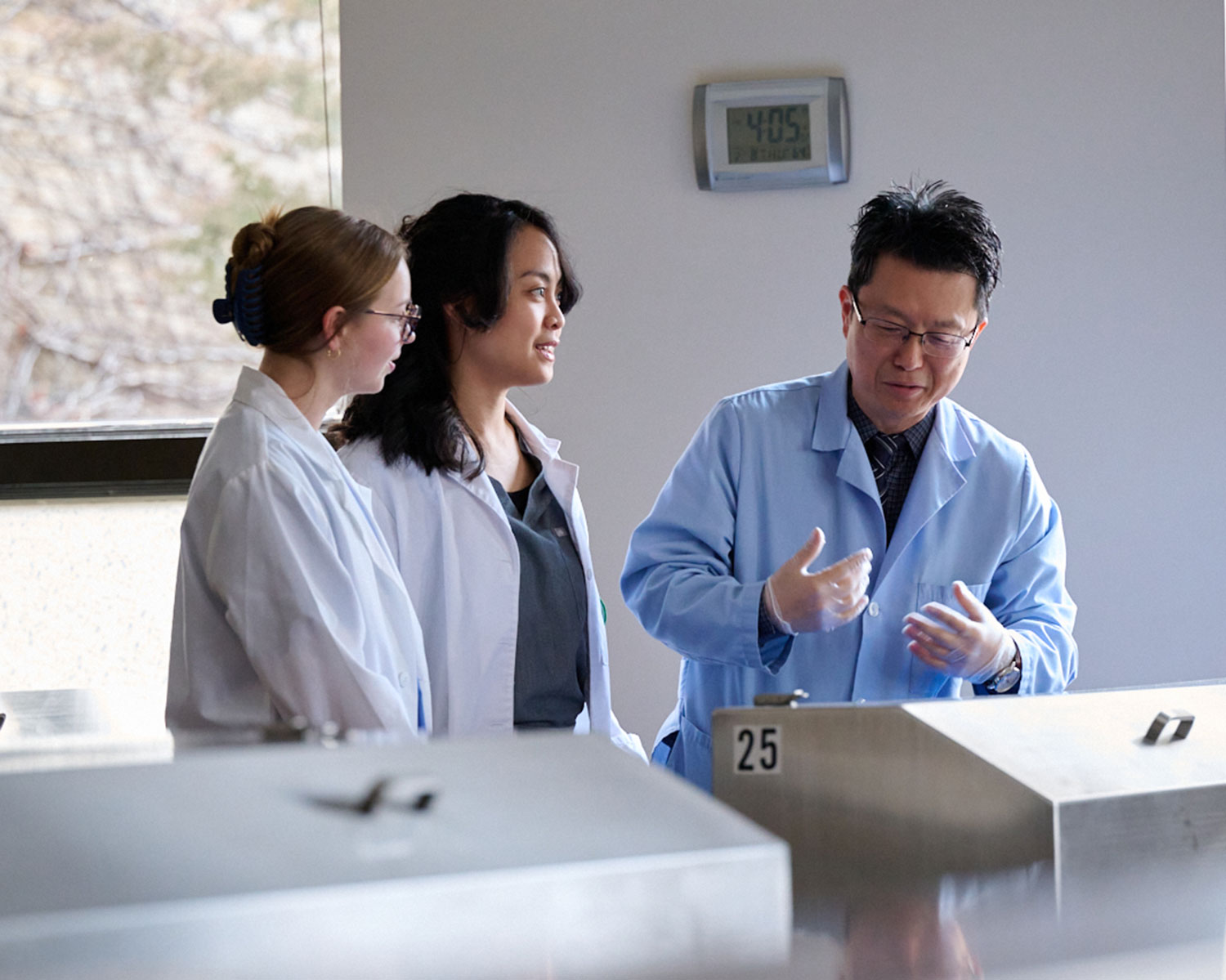 acupuncture professor teaching students in anatomy lab