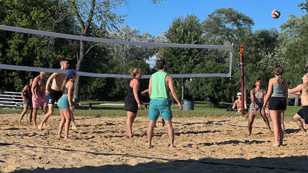 nuhs students playing volleyball