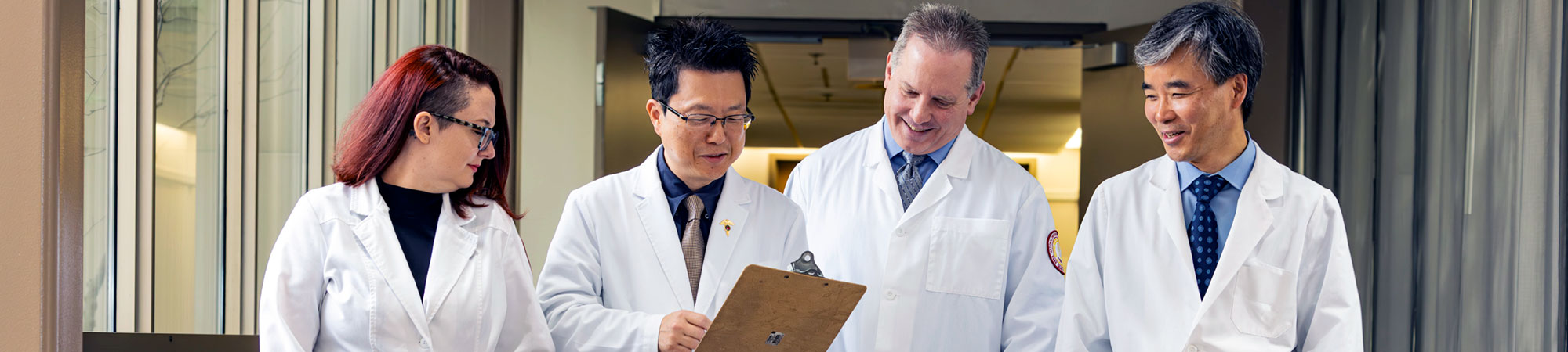 NUHS doctors walking through clinic hallways