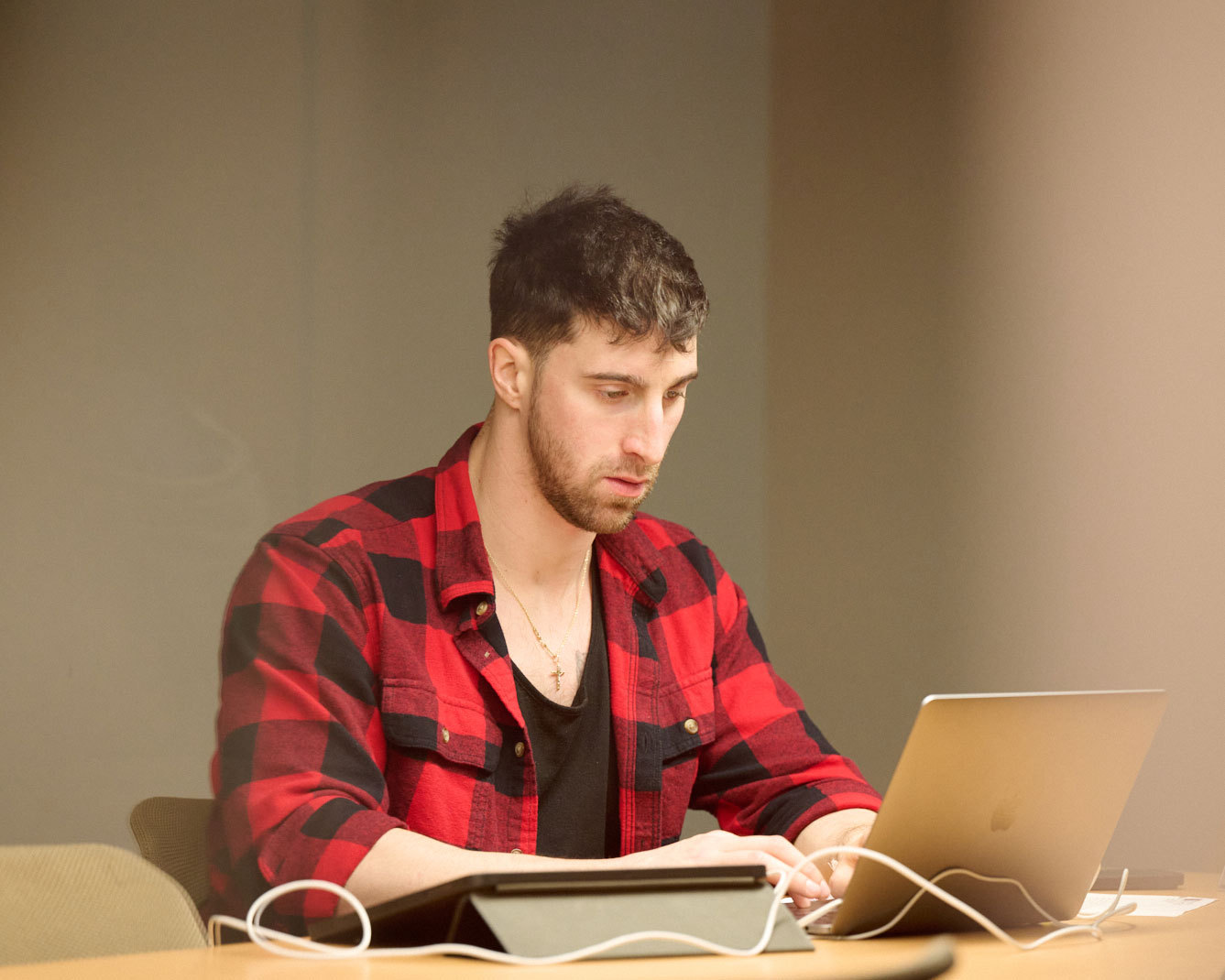 male student on computer