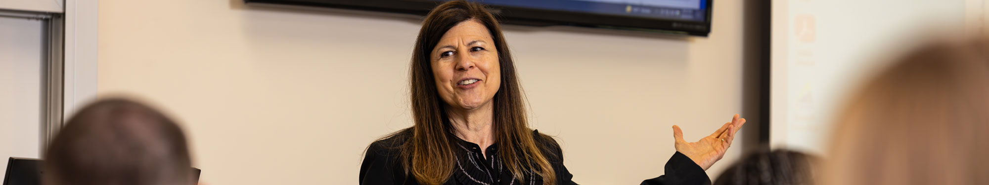 DC instructor in front of business class