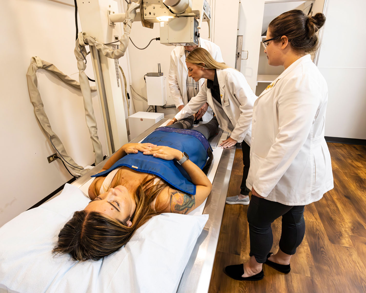 students performing on imaging with a client