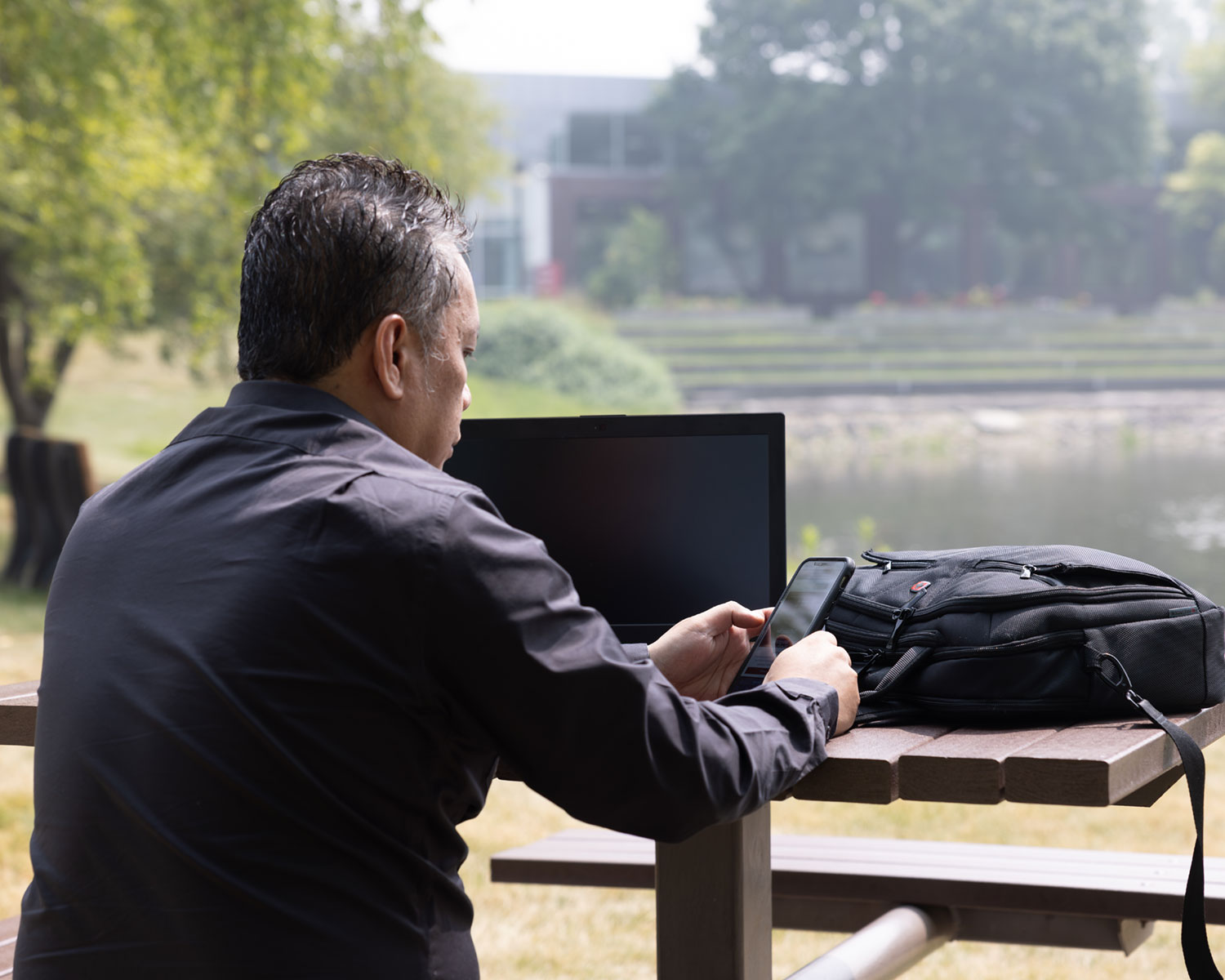 NUHS employee working outside