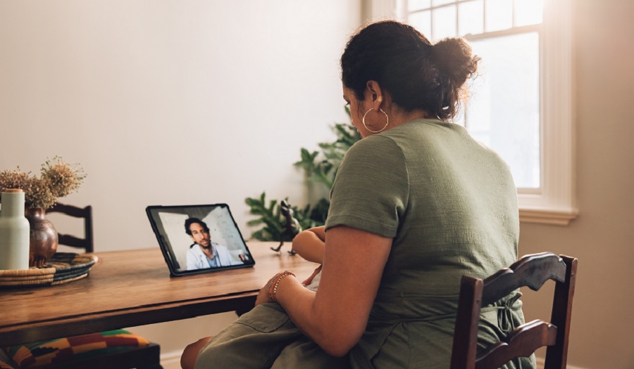Woman having telemedicine appointment with doctor