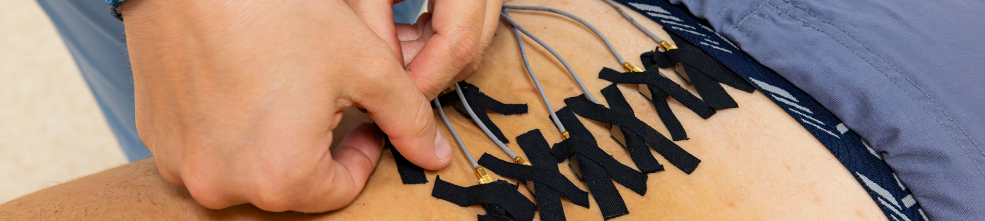 DC intern working on patient in clinic