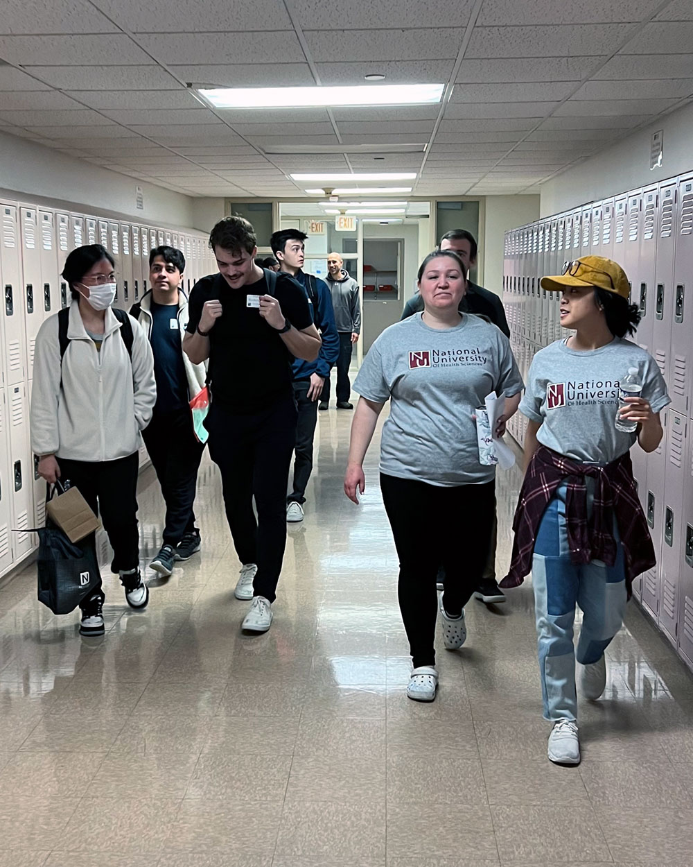 students walking in hallway for student for a day