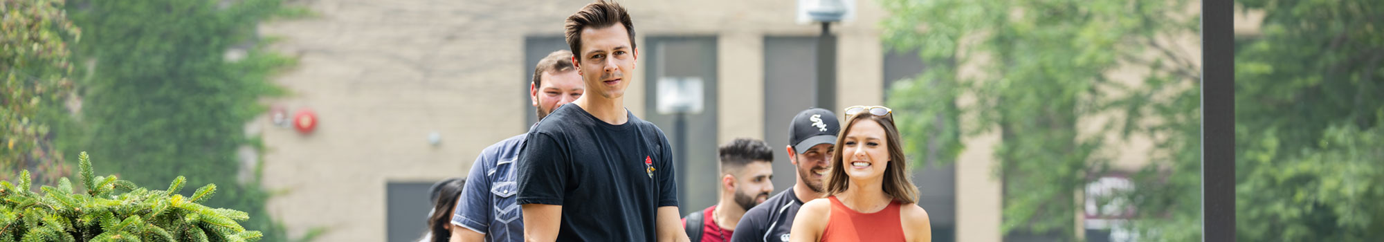 students walking around campus during orientation