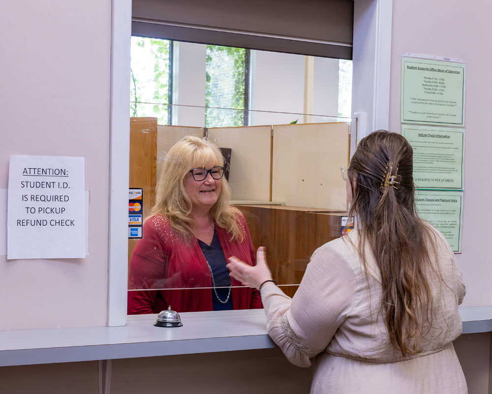 registrar staff at window