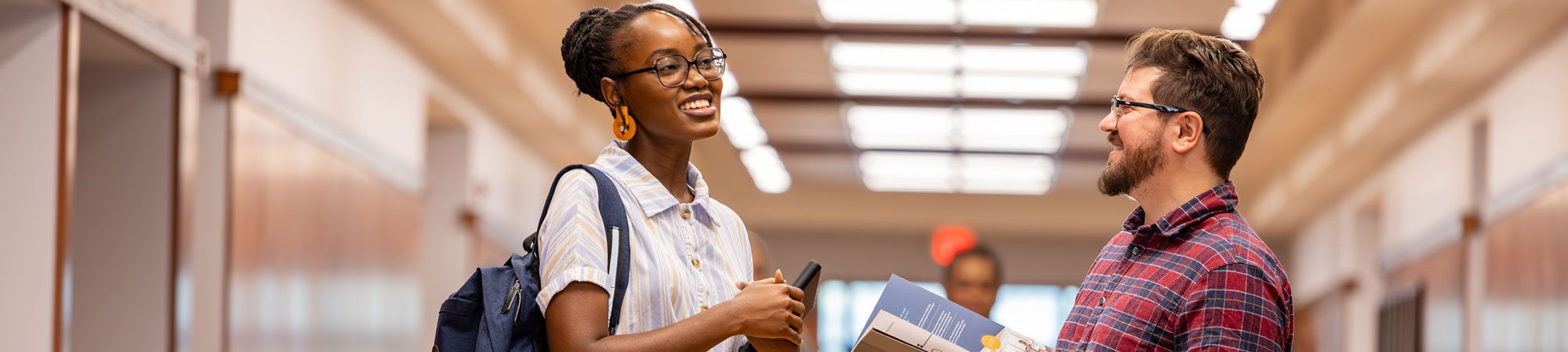 students talking in Janse Hall