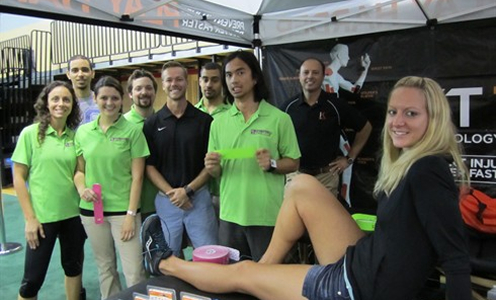 students volunteering at sporting event